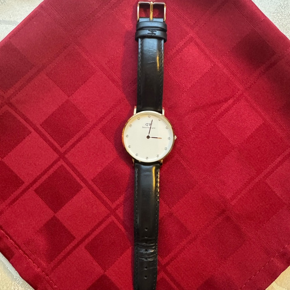 Daniel Wellington Black and Gold Watch
